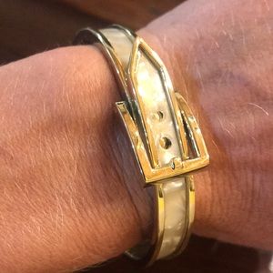 Adjustable Mother of Pearl and Gold toned belt style bracelet